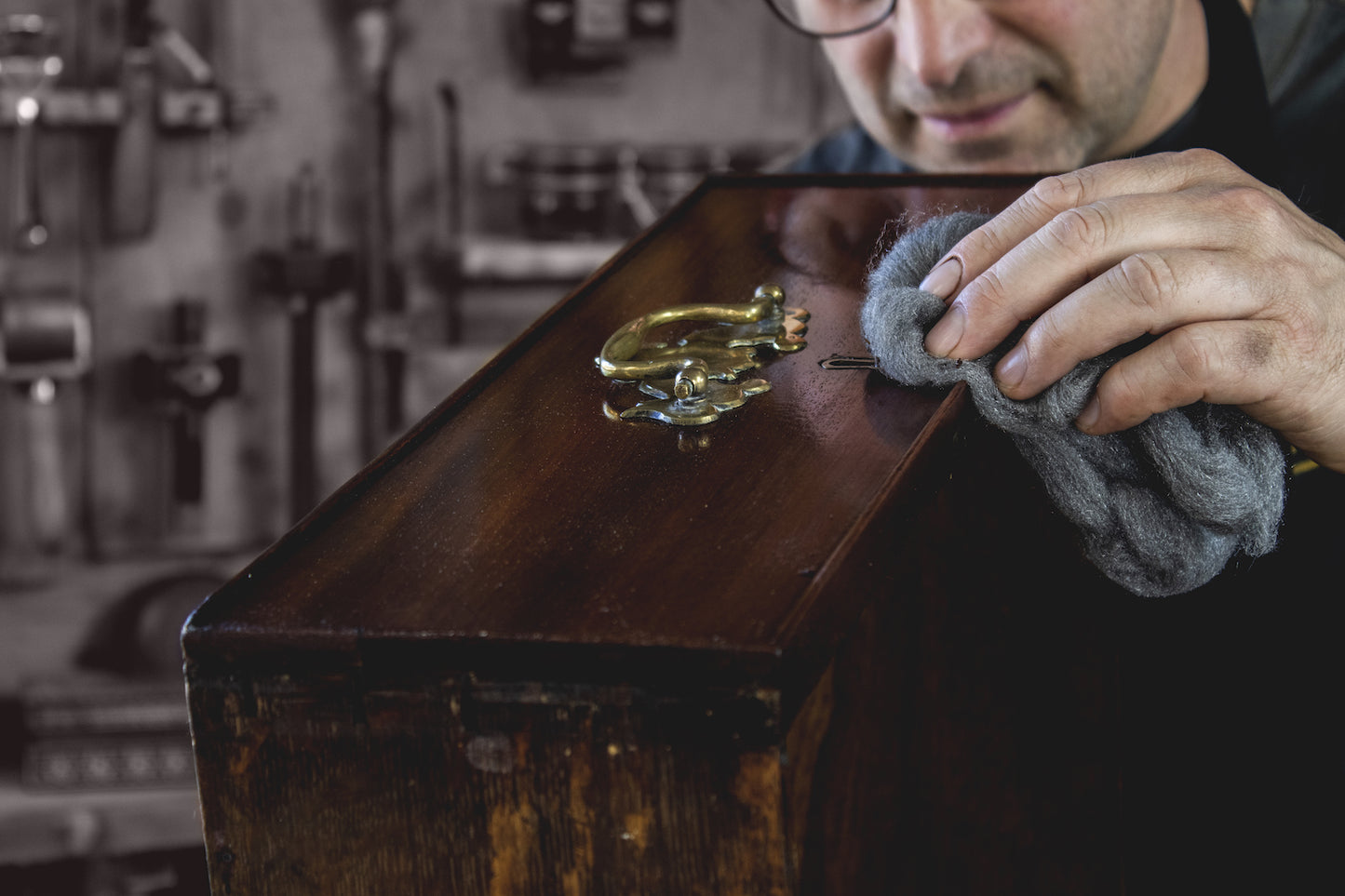 applying polish with steel wool