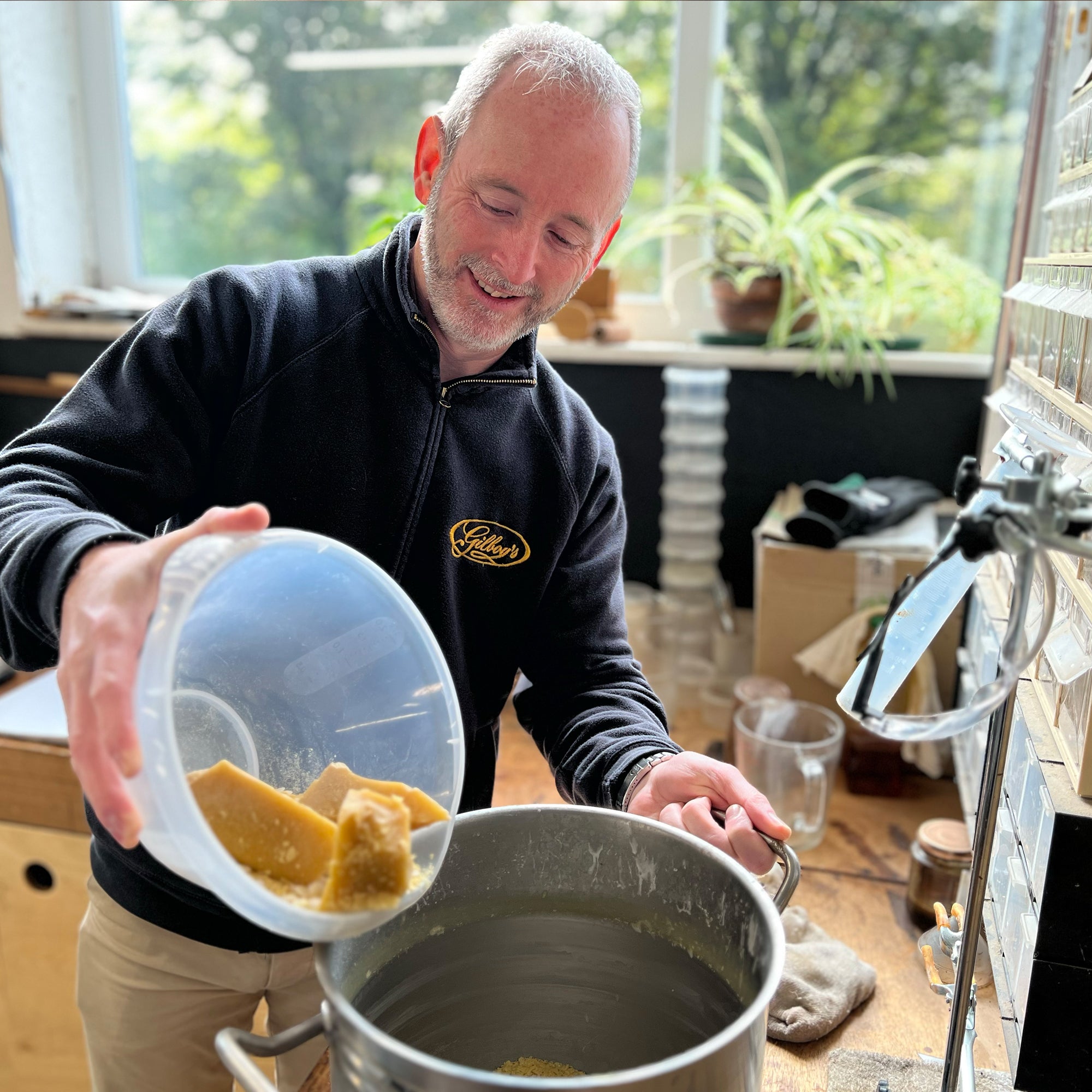 ian melting beeswax for the leather balsam
